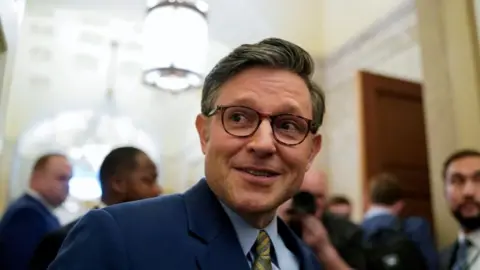 House Speaker Mike Johnson smiling 