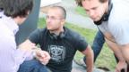 Director Eran Creevy consults his team on set