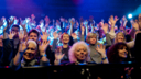 Audience with hands up