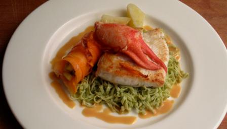 Butter roasted halibut, lobster salad, coriander pasta and a passion fruit sauce