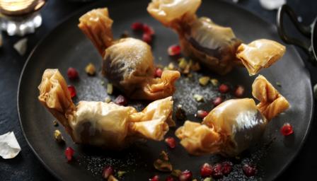 Date parcels stuffed with frangipane and pomegranate