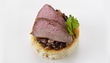 Pheasant suprême with wild mushroom compote