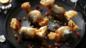 Date parcels stuffed with frangipane and pomegranate