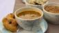 Sambhar vada: yellow lentil soup with spiced doughnuts