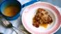 Apple and plum pudding with rum caramel sauce