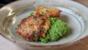 Crab cakes and crushed peas