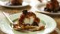 Deep-fried ice cream with rum and raisin sauce