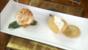 Liquorice poached pears with praline and honey ice cream