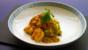 Prawn curry with potato fritters 