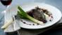 Pigeon breast with red wine gravy, roast leeks and wild mushrooms