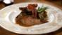Wild duck with apple, rosemary stuffing and sherry sauce 