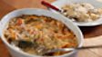 Baked pappardelle with pancetta and porcini