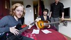 Simon, James and Ben warming up in the bedroom