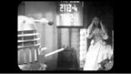 A Dalek Orders Victoria onto a Weighing Device