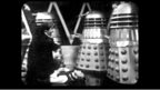 The Doctor and Waterfield Surrounded by Daleks