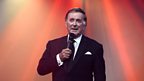 Sir Terry Wogan introduces the evening's main vocalists