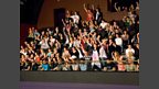 The balcony crowd show their appreciation
