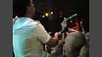Dave encourages the Glasgow crowd to join in