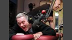 Chris takes a pummelling from masseur Big Steve