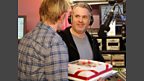 Radio 1 boss Andy presents Chris with a congratulatory cake as he passes the 37 hour mark!
