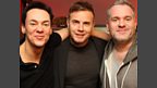 Gary Barlow congratulates Chris and Dave and presents them with their official Guinness certificate.