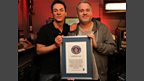 Chris and Dave receive their official certificate from Guiness for the Longest Marathon Radio Show.