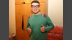 Chris tries on Greg's jumper