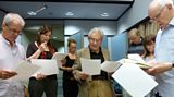 Looking over the script in studio