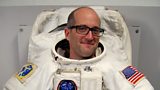 Space suited and booted