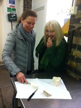 Marlena Spieler and Bronwen Percival tasting cheese.JPG
