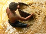 Washing gem gravel at a mine in Sri Lanka
