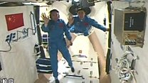 Astronauts enter China