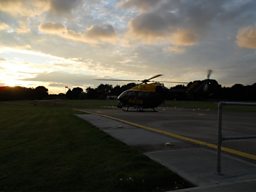 The crew has received a call from a unit in the city and the helicopter takes off to assist at dusk
