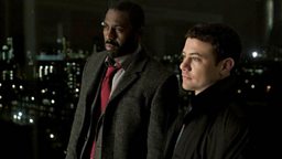 DCI John Luther (Idris Elba) and DS Justin Ripley (Warren Brown)