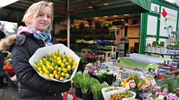Photo: Ike with tulips at a Dutch flower stall