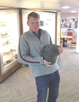 A big lump of rock with tin inside