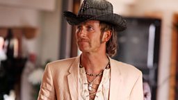 DENNIS WHITEHEAD played by Paul Kaye