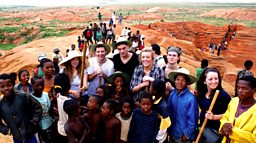 Photo: The group with locals at the sapphire mine, Madagascar