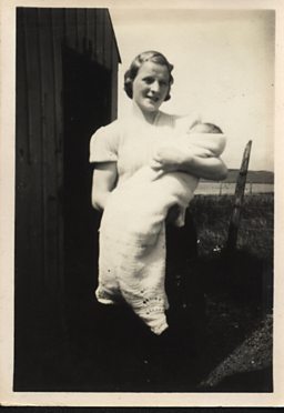June Barbour, as an infant,  pictured with her mother.