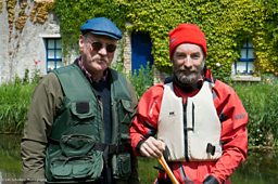 Paul Evans with the boatman and photographer Jim Schofield