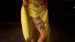 Butterfly tattoos on a woman's leg