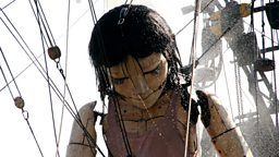 Video feature: Giant puppets roam Liverpool 