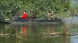People fishing on the Danube
