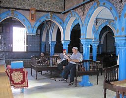 Men at prayer inside El Ghriba synagogue, Djerba, Tunisia