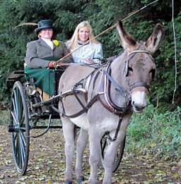 Ellie in a carriage