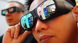 Man wearing 3D glasses