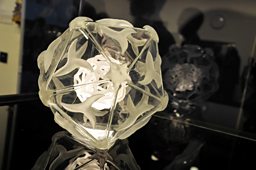 Glass artpiece inspired by the Hand Foot and Mouth virus structure. Image courtesy of Diamond Light Source