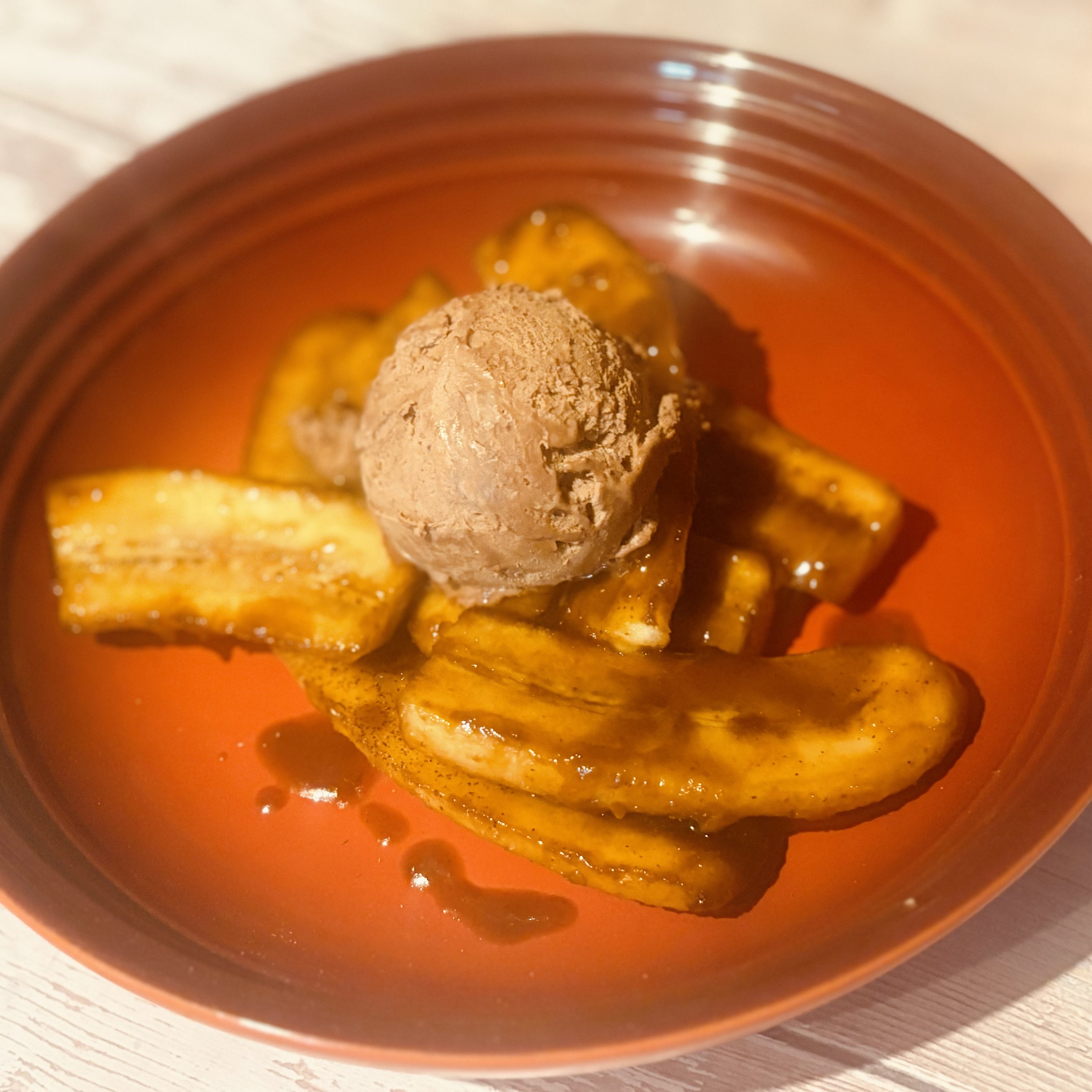 Homemade Chocolate Ice Cream with Rum Flamed Bananas