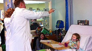 Image for The Singing Doctors visit sick children in hospital in Wrexham, North Wales