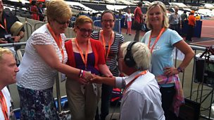 Image for Peter down on one knee to greet Games Makers